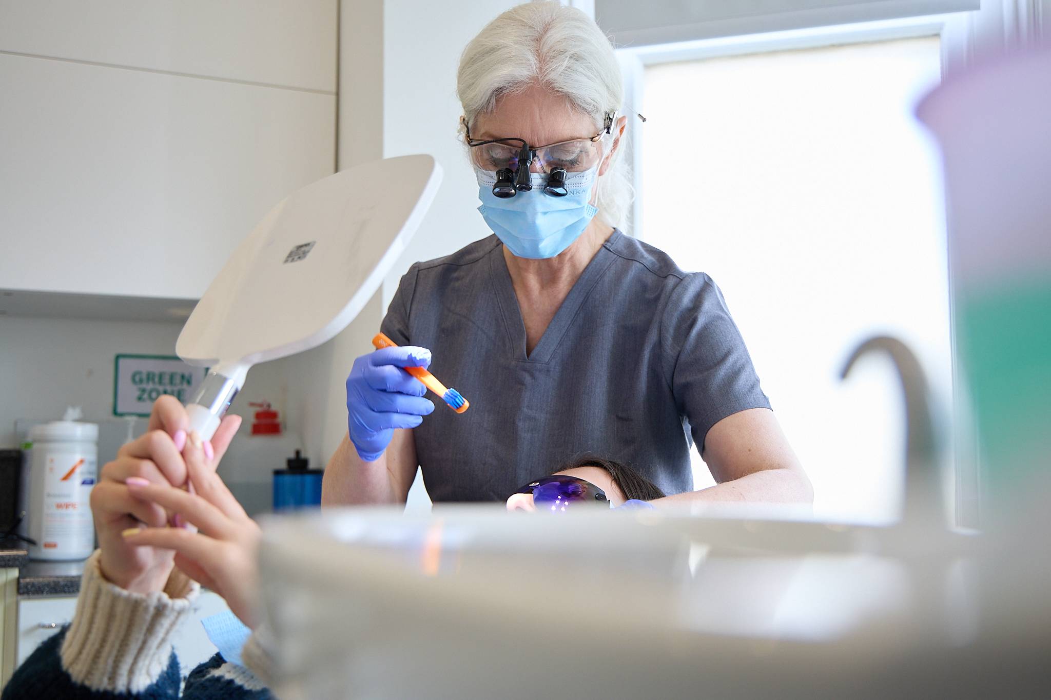 Cathy Barber working on a patient