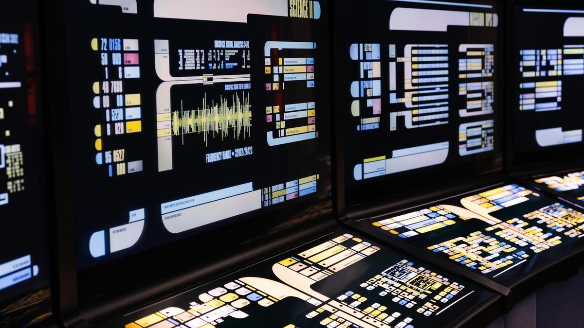 High-tech command center with advanced digital displays and control panels