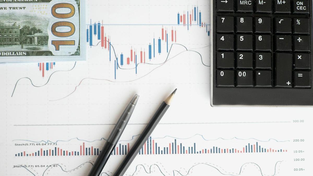 Stock analysis workspace featuring charts, a calculator, and currency for data-driven insights.