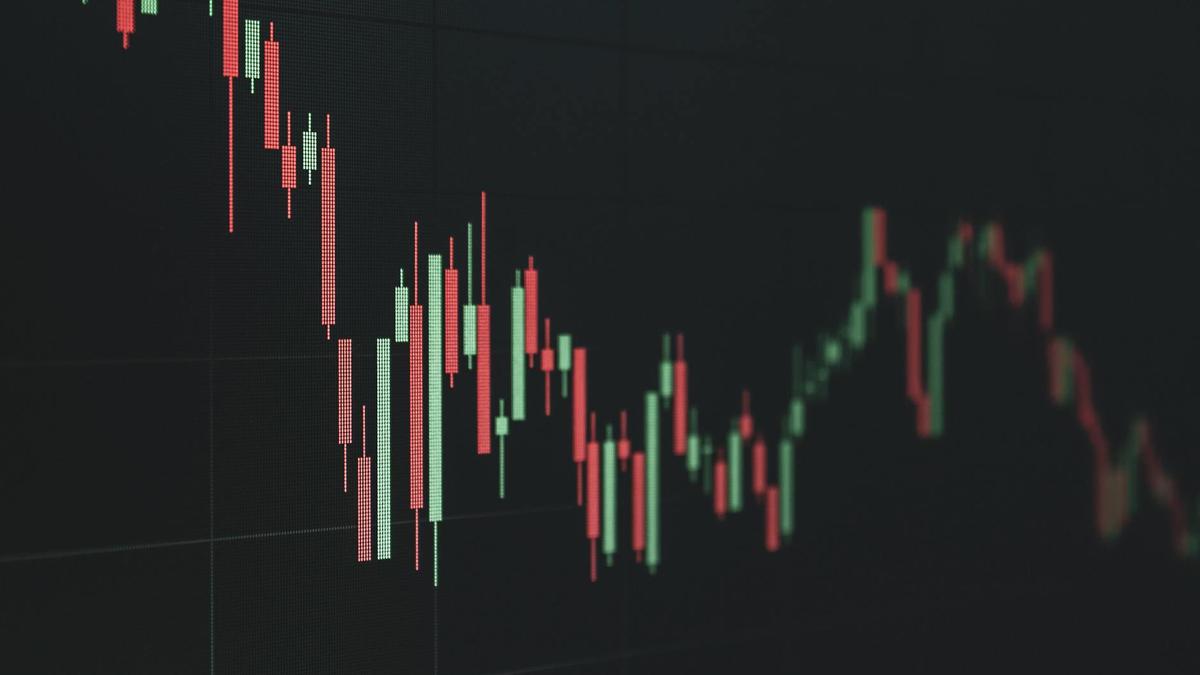 Stock market data chart showing trends in red and green. Perfect for financial and business themes.