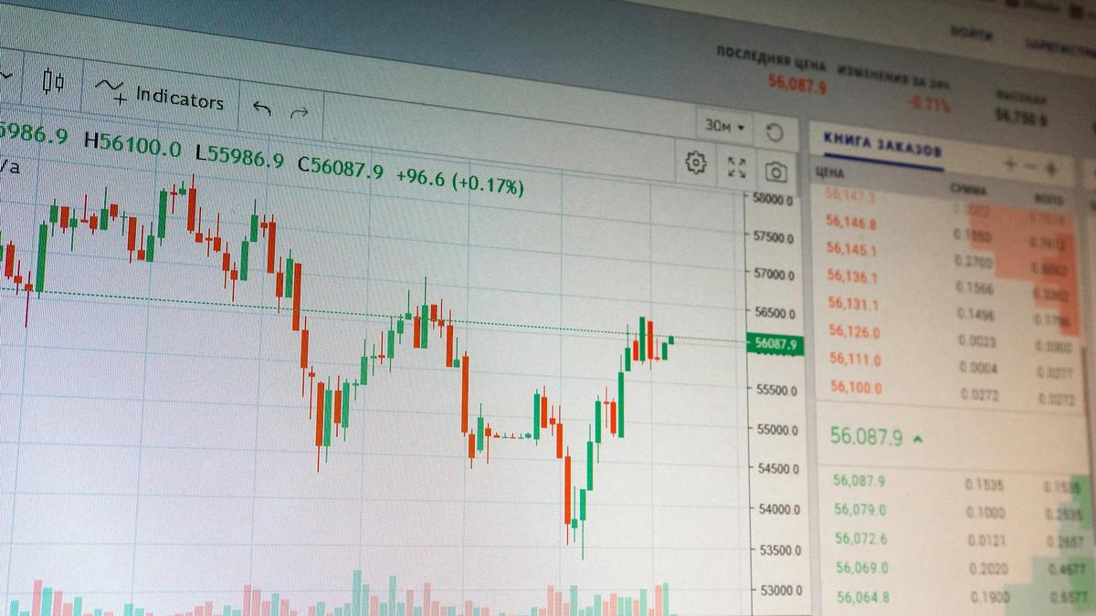 Close-up of digital cryptocurrency market graph showing price fluctuations and trading data.