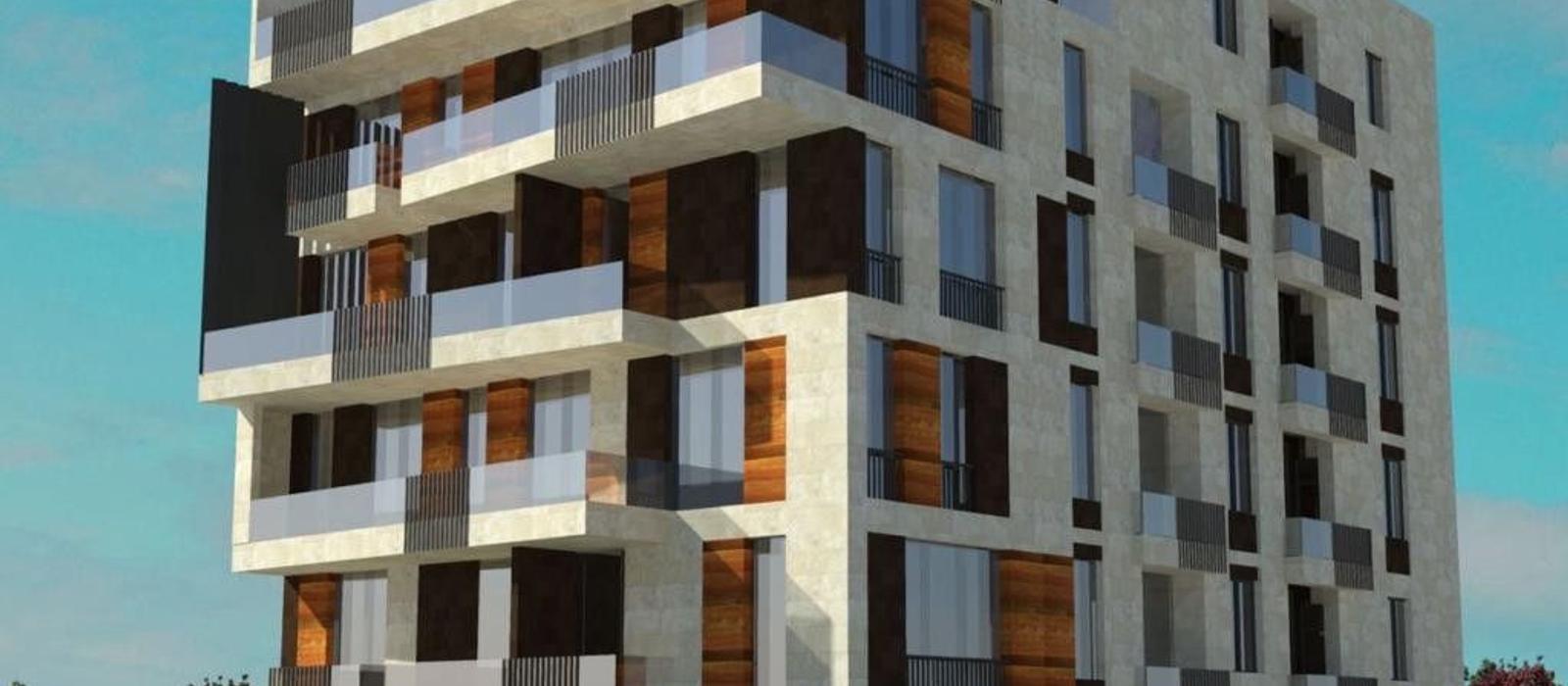 Architectural render of Cascade Hill Apartments, a six storey stone clad residential building in Yerevan with recessed balconies and timber detailing.