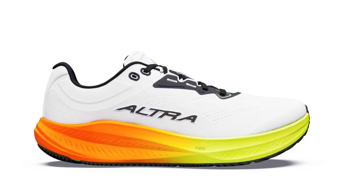White Altra Torin 9 running shoe with a black logo and orange-to-yellow sole