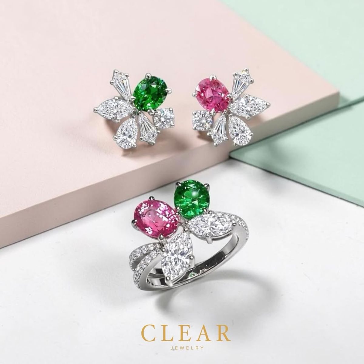 Pastel pink and mint composition with tsavorite and pink tourmaline butterfly earrings and a matching ring.