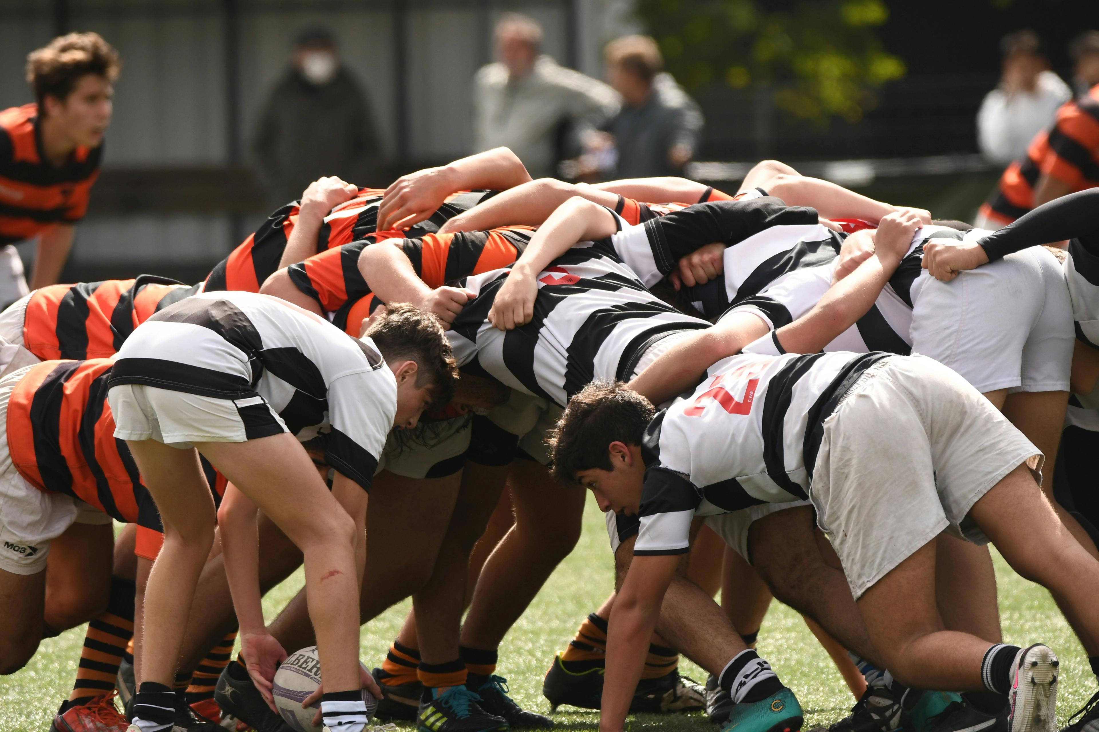 Boys playing rugby