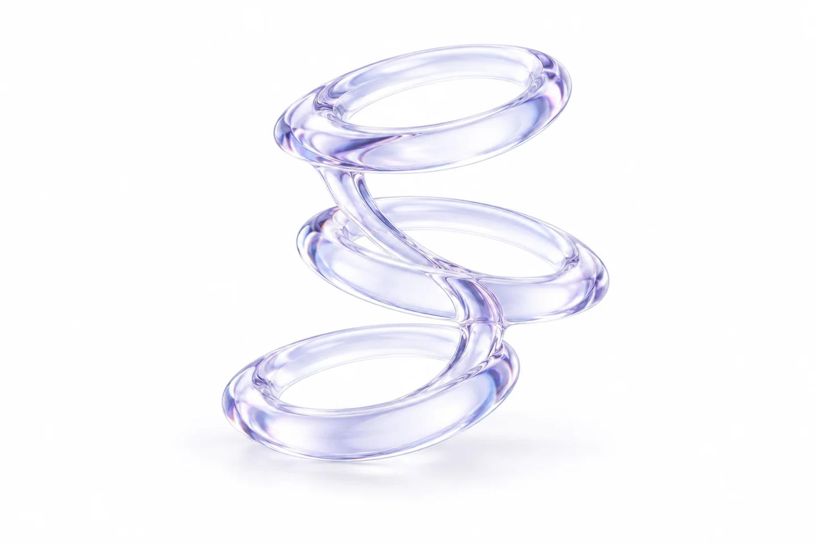 Three offset oval glass rings join along a curved spine, with pale lavender reflections on white.