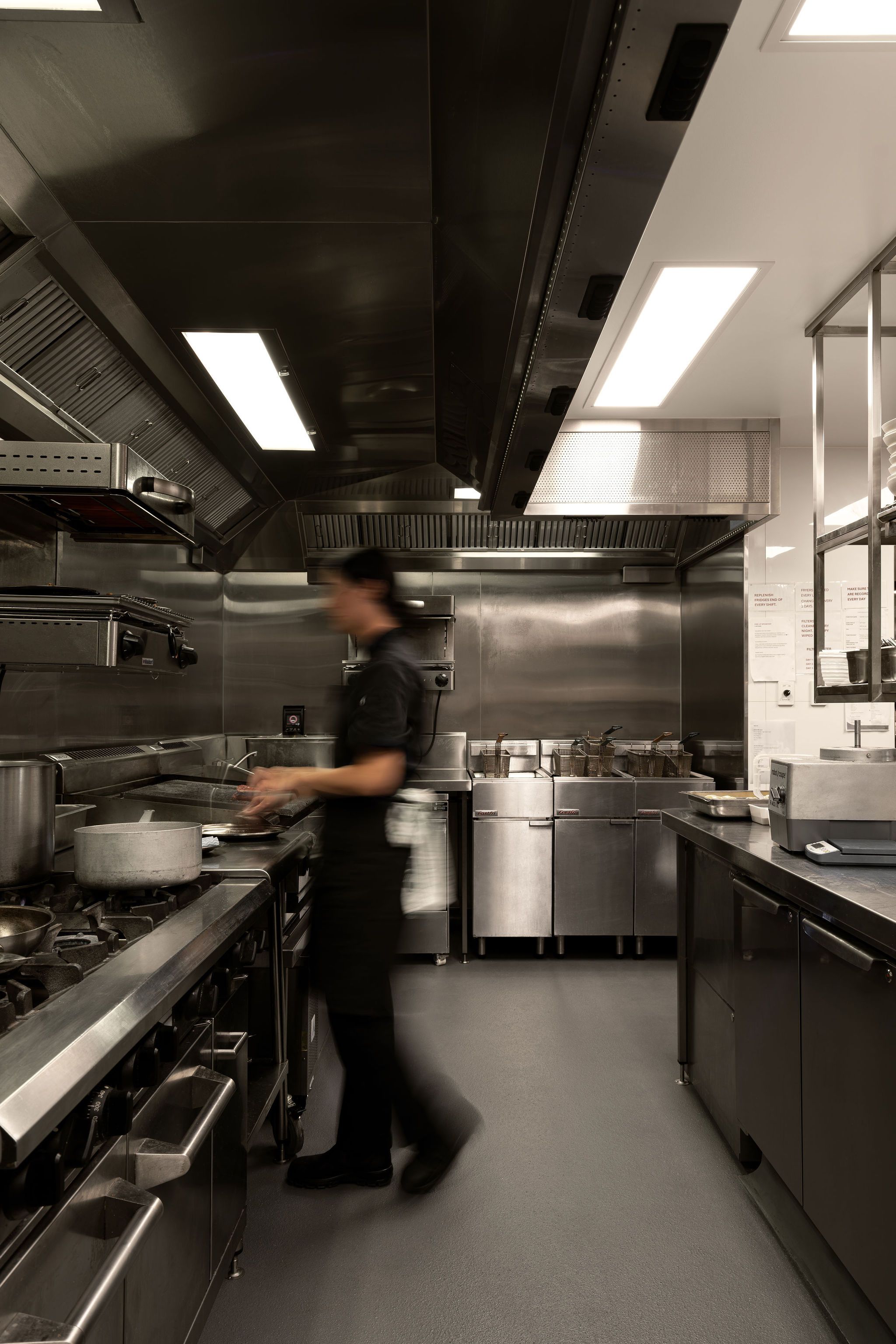 Person working in kitchen | Studio Hiller