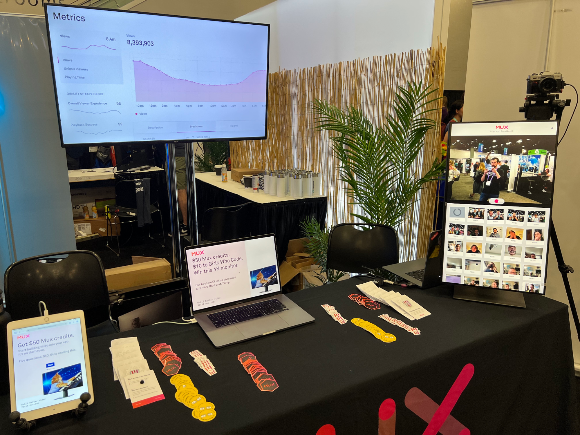 A picture showcasing the Mux booth setup at React Miami