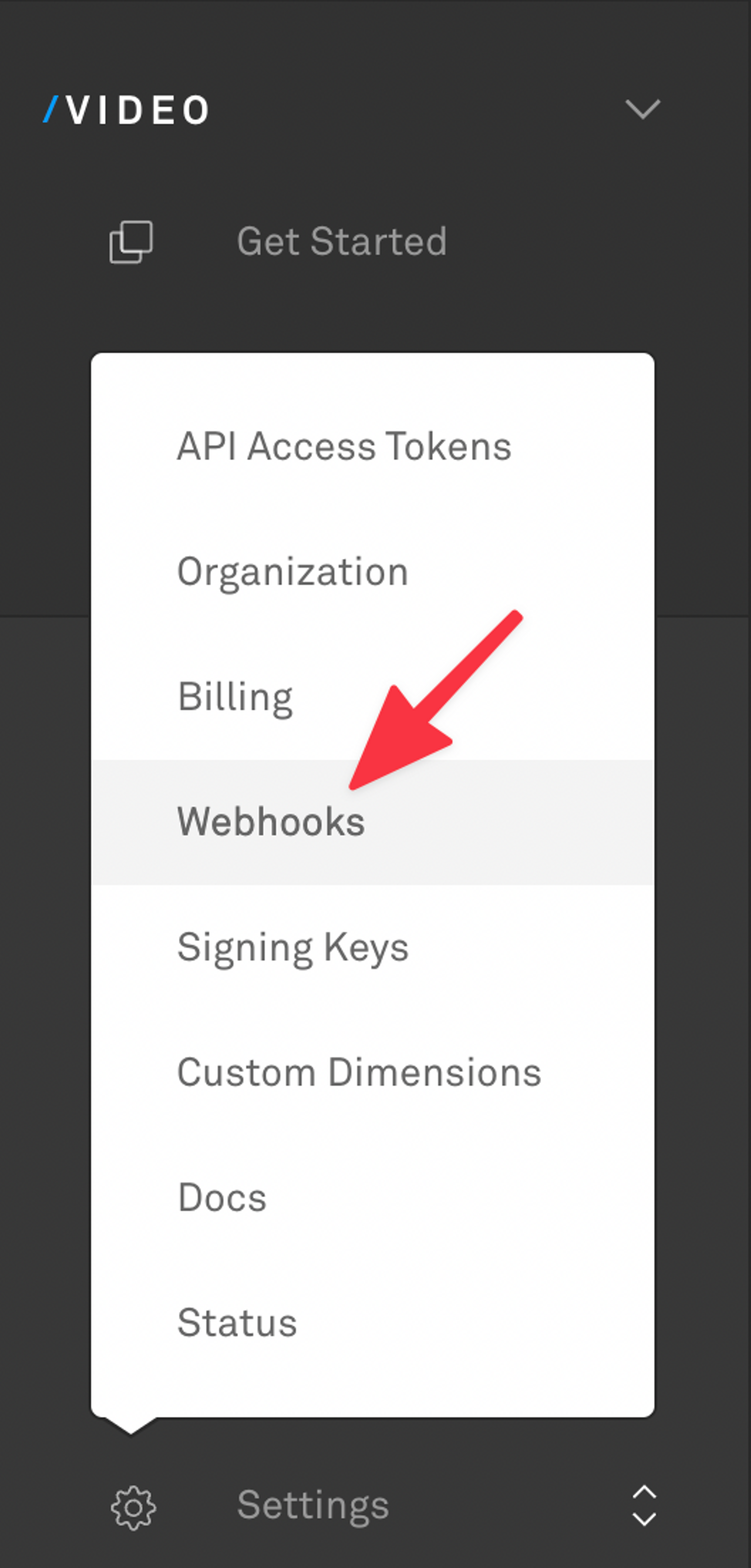 A left-hand menu in Mux's dashboard with a red arrow pointing to Webhooks.