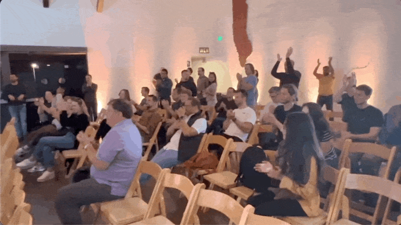 Audience clapping.