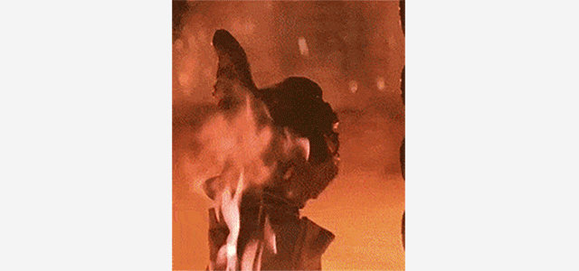 GIF of thumbs up sinking down into lava.