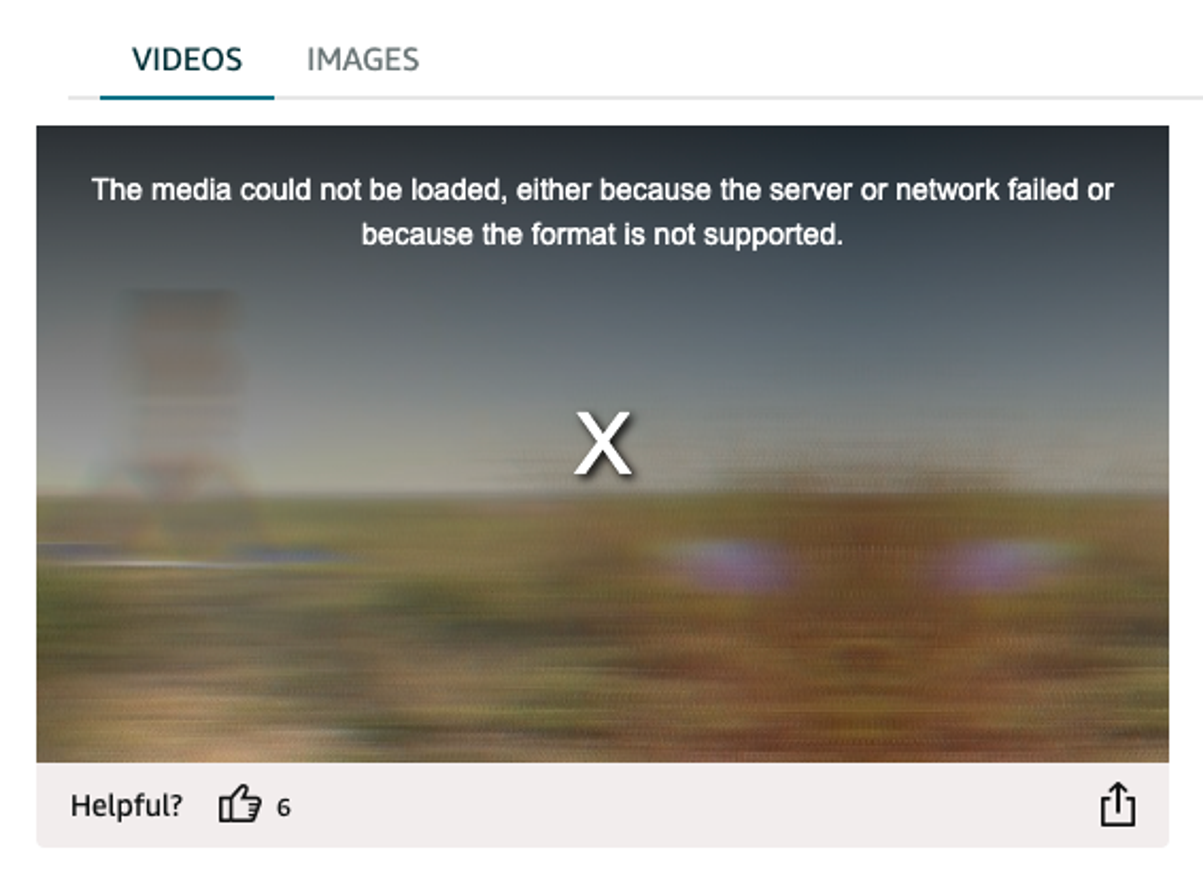 Video.js v8 error state on Amazon.com, displaying a large white "X" over a blurred video thumbnail with an unstyled error message at the top.