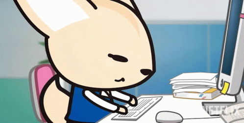 Fenneco from Aggretsuko typing on her keyboard