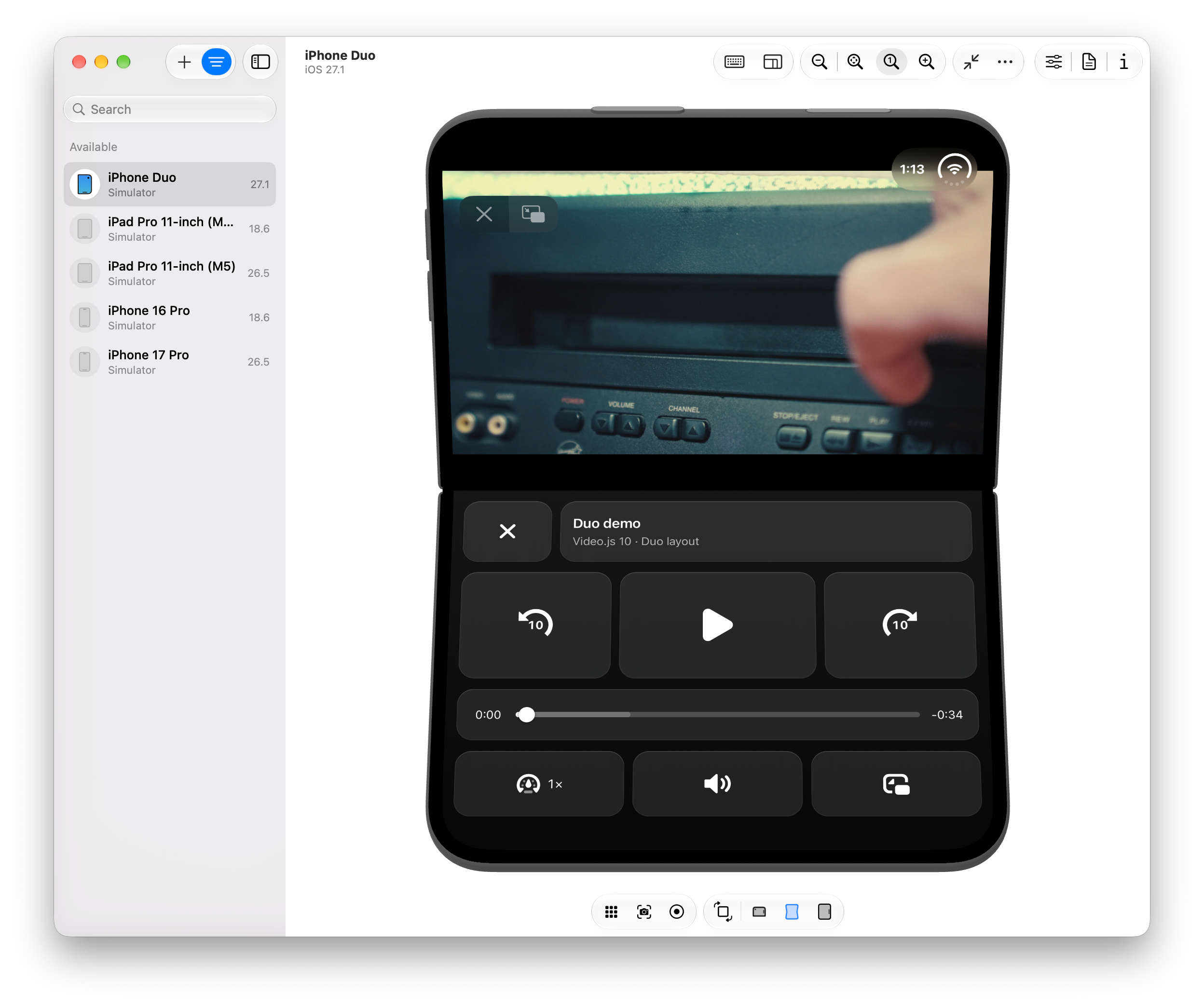 Video.js on a folded iPhone Duo with the video on the top half and Netflix-style tiled controls filling the bottom half