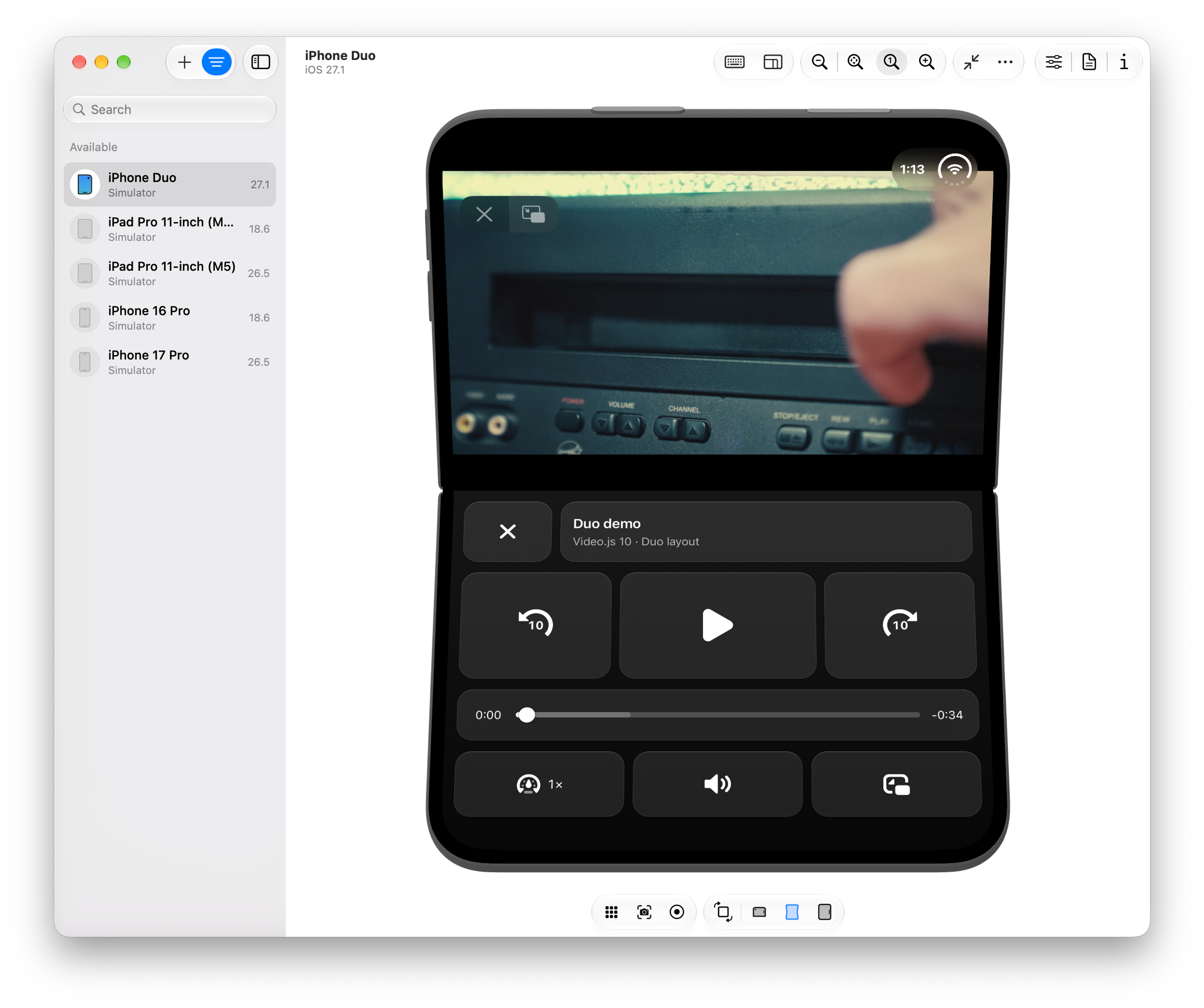 Video.js on a folded iPhone Duo with the video on the top half and Netflix-style tiled controls filling the bottom half