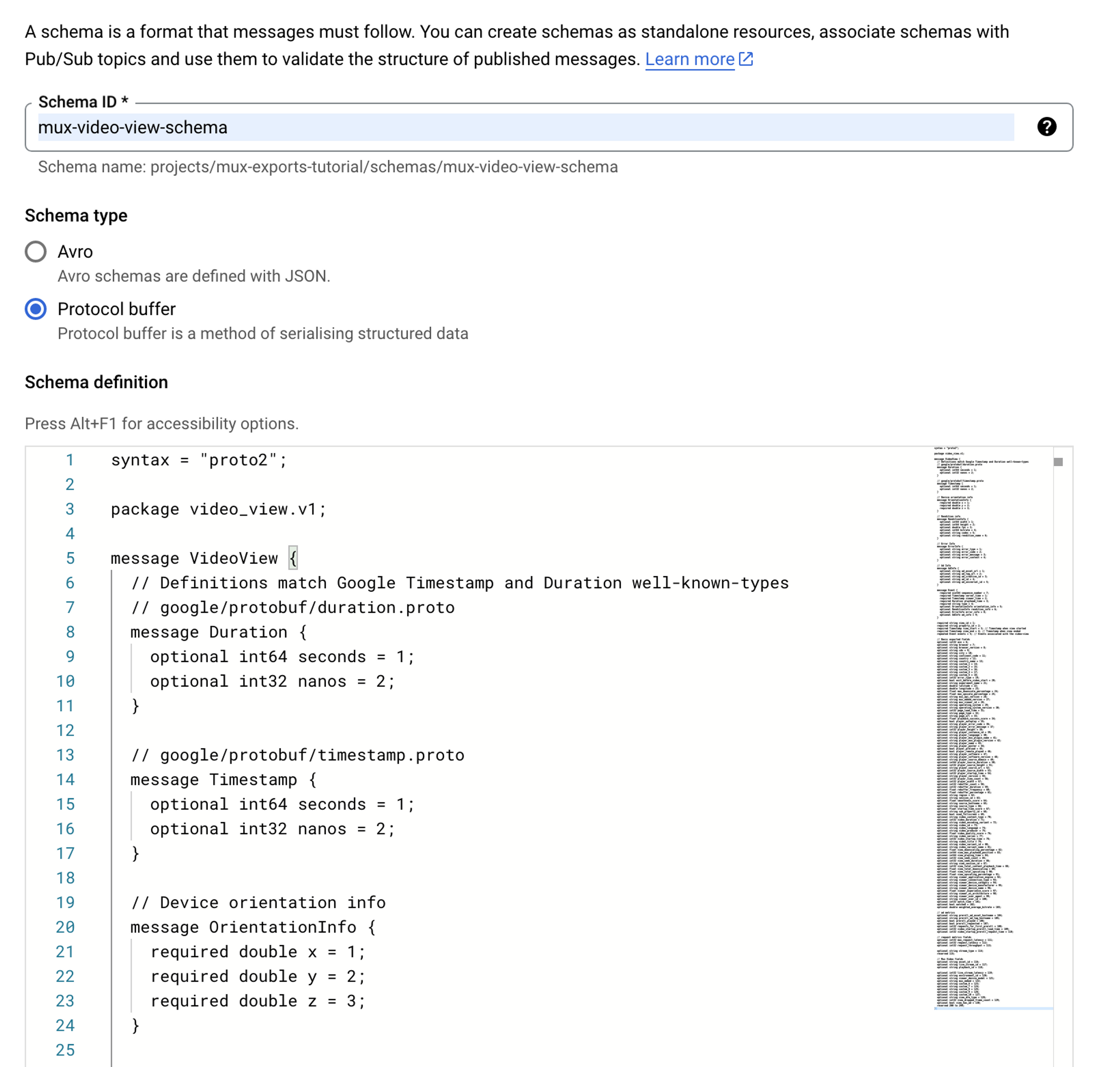 A screenshot showing the new schema form. The schema ID value is mux-video-view-schema. The Schema type is "Protocol buffer". The Schema definition contains the proto file contents mentioned above.