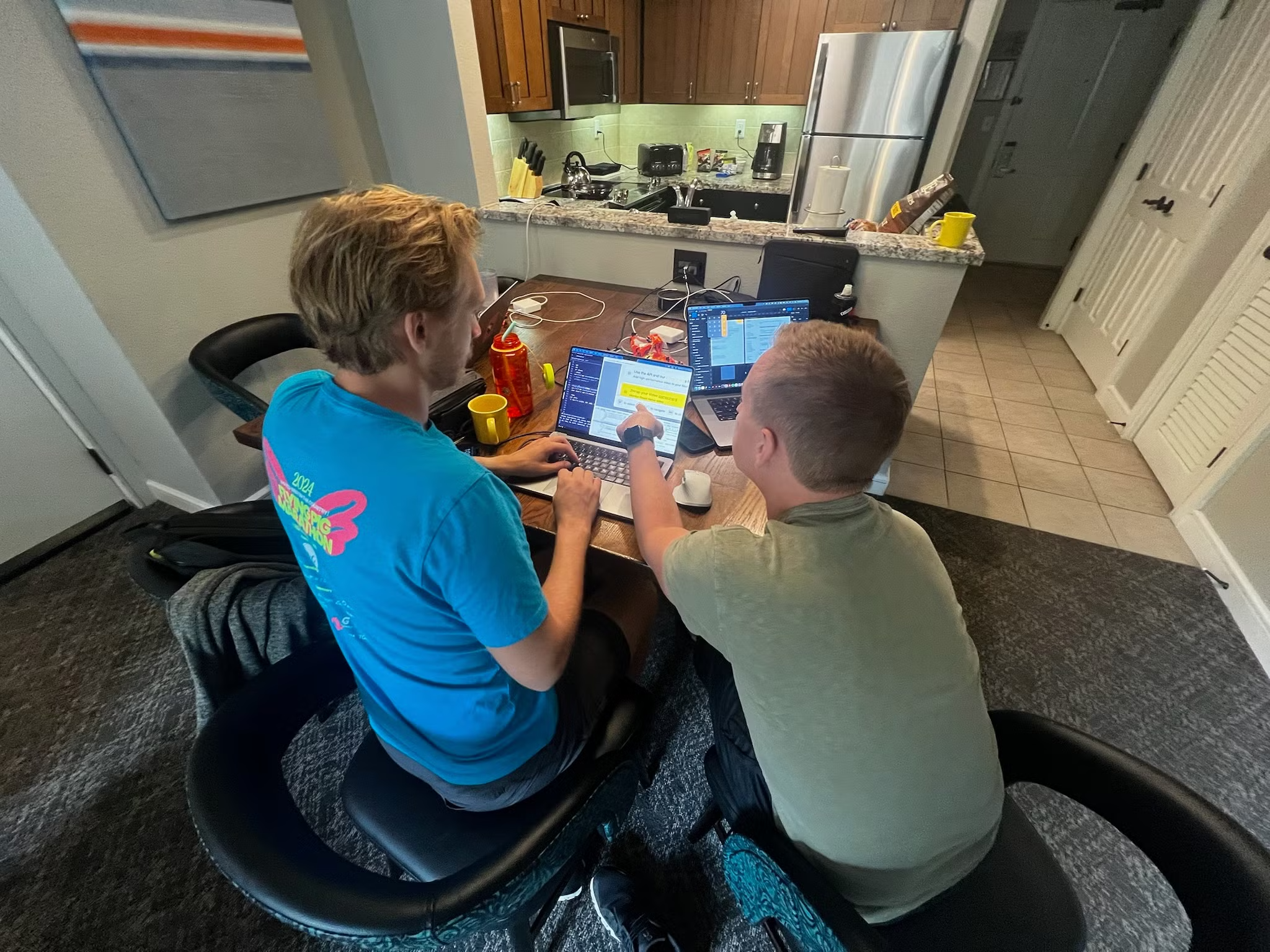 Rob and Dar working in the hotel room