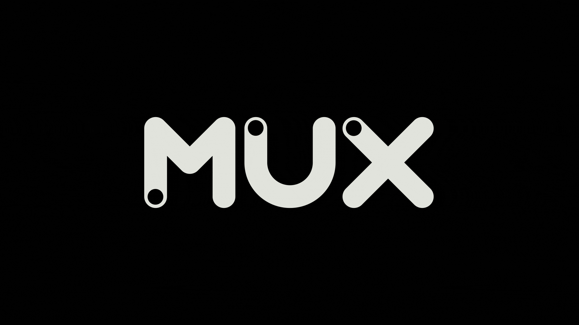 An animation showing three dots, one in each letter of the Mux logo, sliding along the fill of the letter, as if to demonstrate switching a toggle on and off.