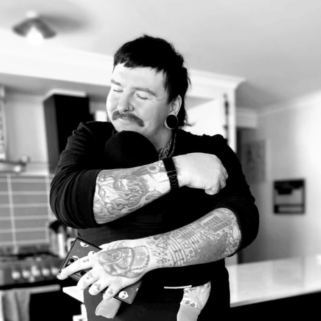 Matt hugging baby