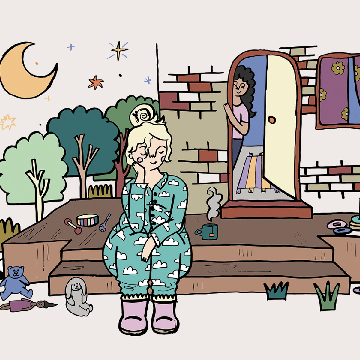 Woman sitting outside with cup of tea looking happy