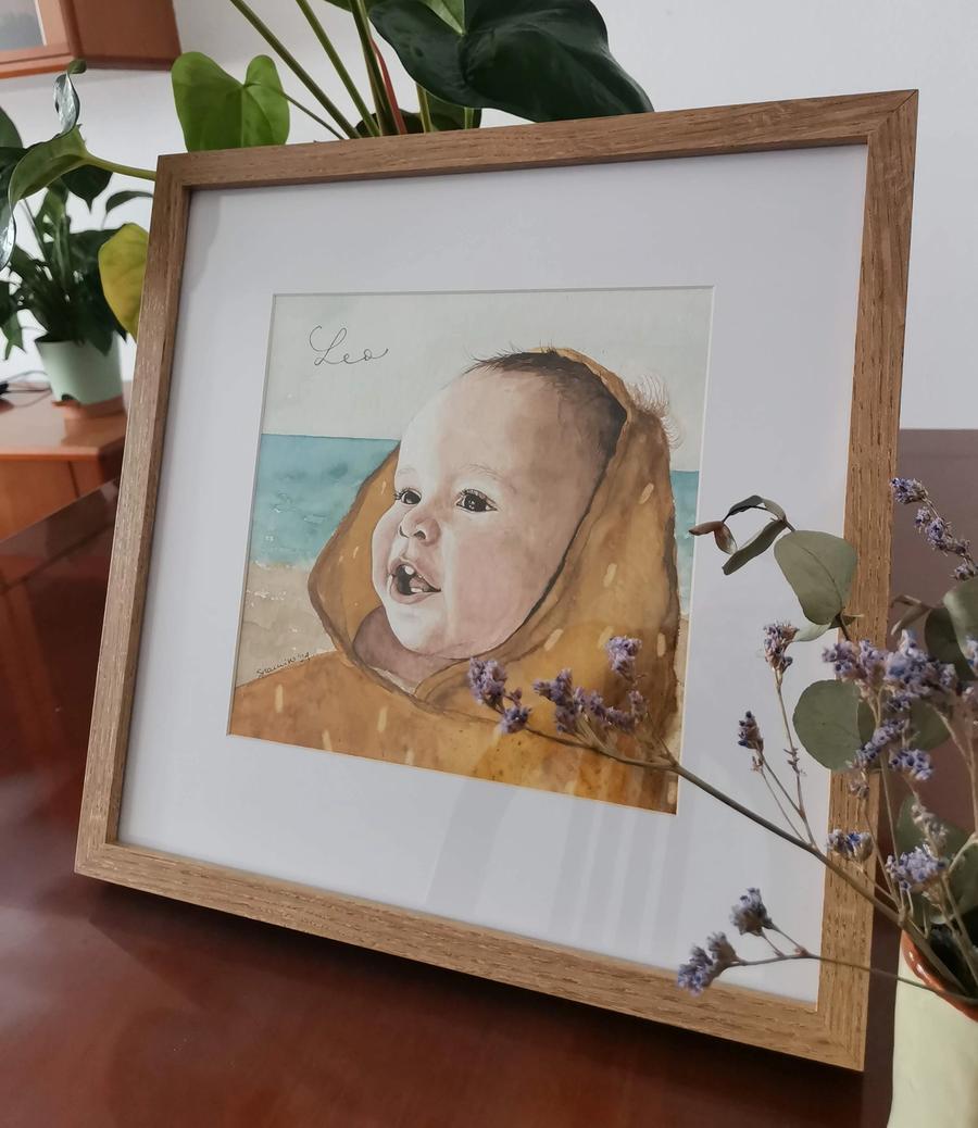 retrato en acuarela de un bebé