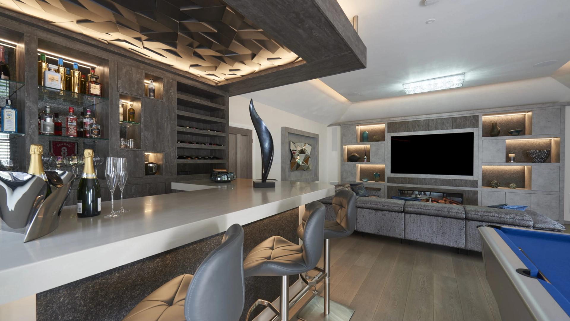 Bespoke entertainment room with media area and home bar