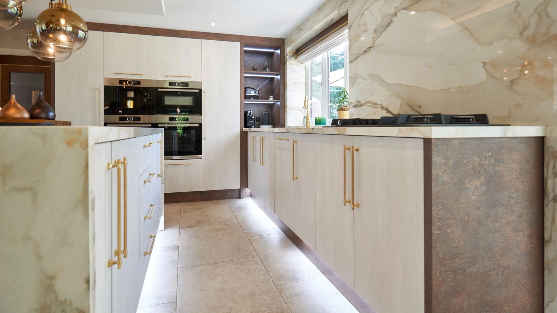 Bespoke kitchen with gold touches and Hafele fixtures