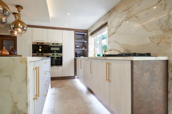 Kitchen with gold touches and Hafele fixtures