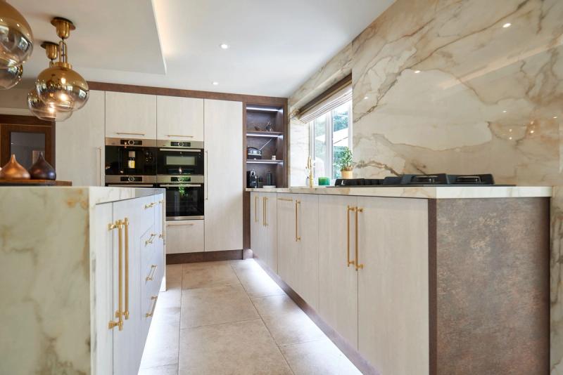 Kitchen with gold touches and Hafele fixtures