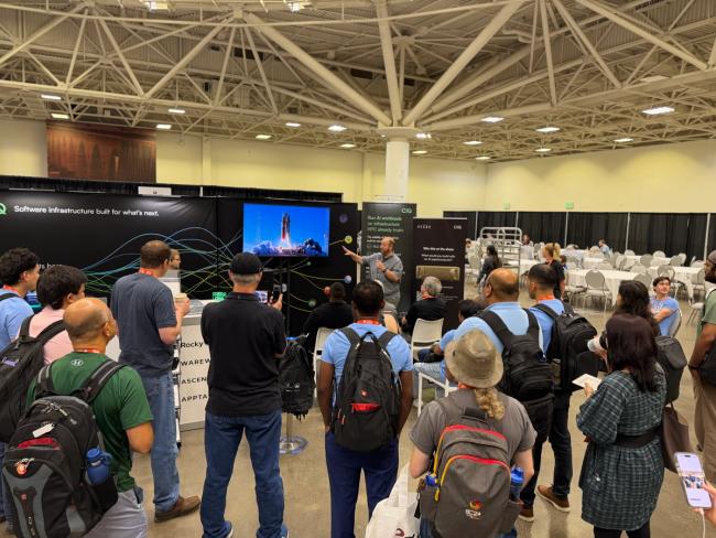 The PEARC26 audience watches Artemis launch footage during the Flight Sciences Lab talk