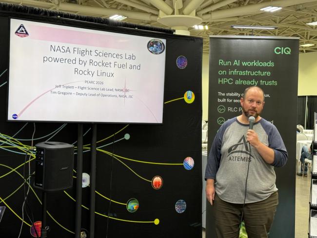 Jeff Triplett opens the NASA Flight Sciences Lab talk at the CIQ booth at PEARC26