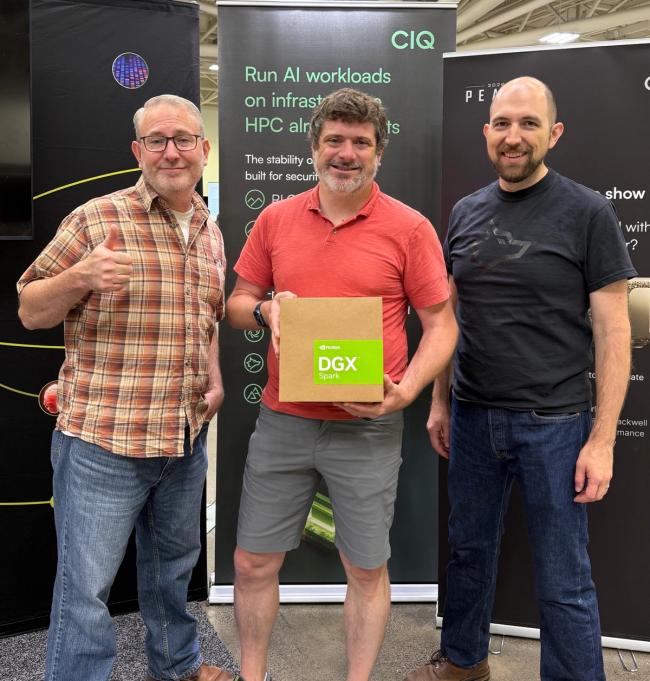 Handing off the NVIDIA DGX Spark at the CIQ booth