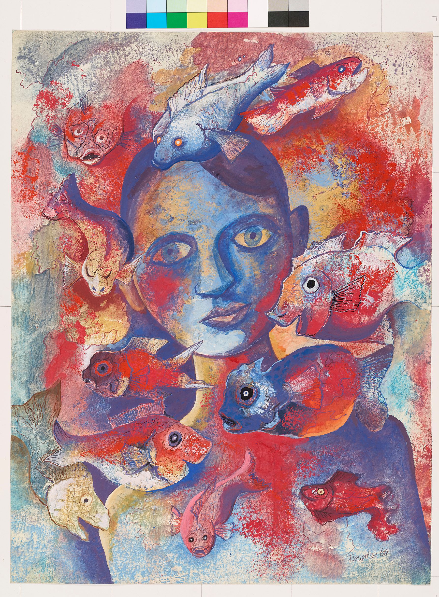 Ein Junge blickt durch eine Scheibe auf die roten und blauen Fische in einem Aquarium.