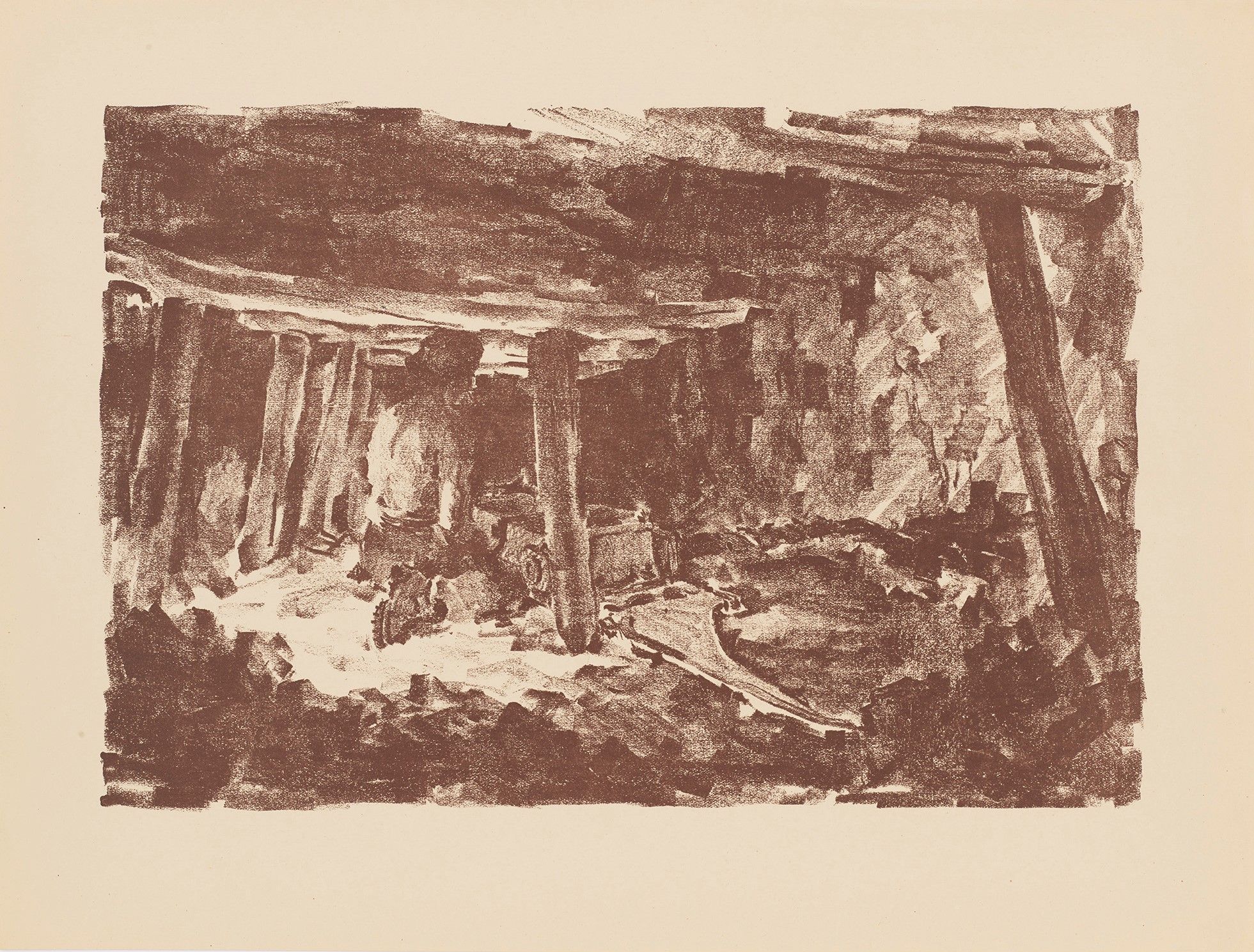 Eine Person sitzt in einer Kohlemine.