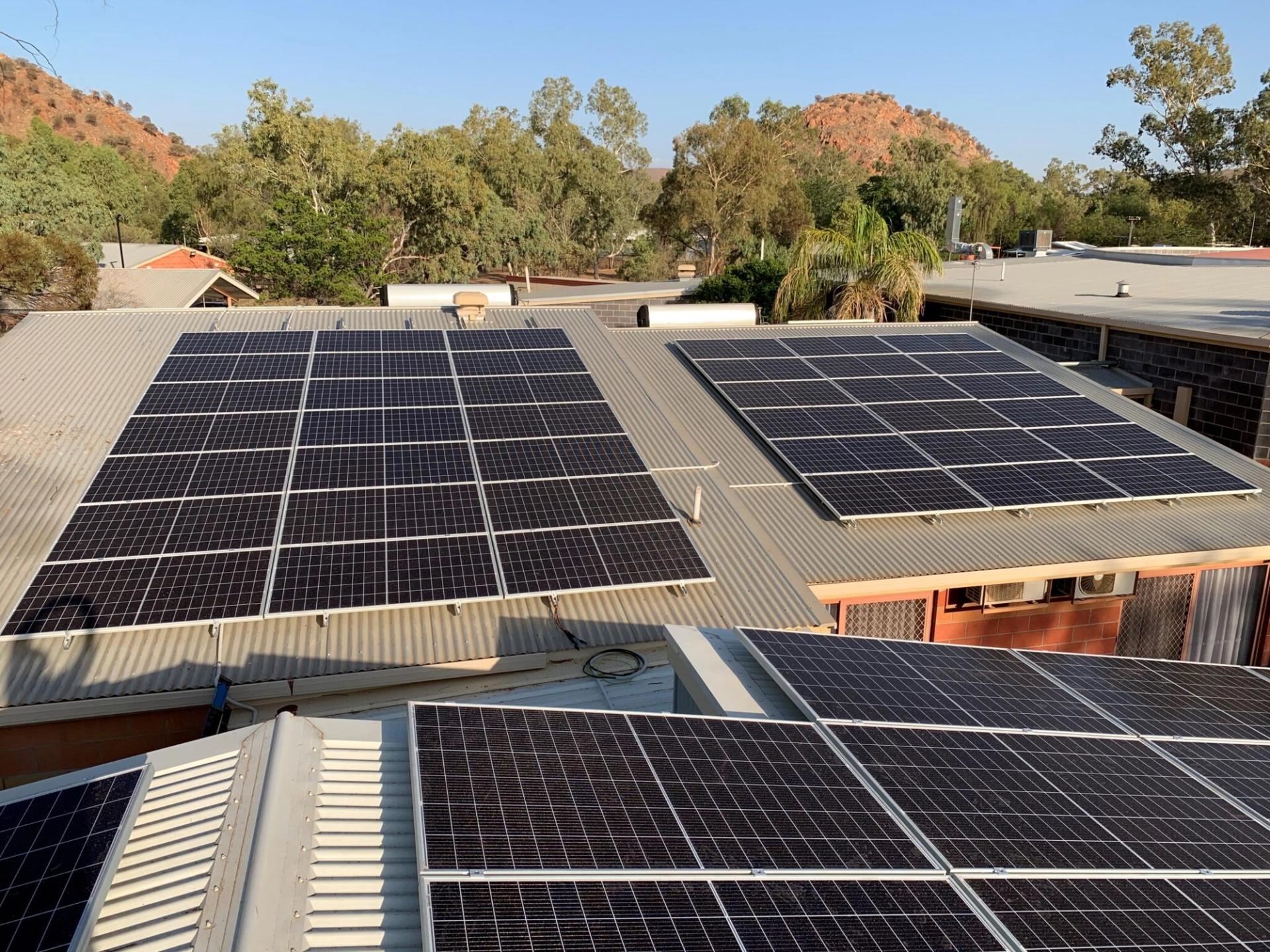 Solar panels on a tin rooftop