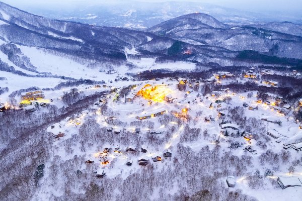 Madarao resort light up at dusk, from above