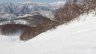 View of a piste run looking down the valey at Minakami Kogen Ski Resort
