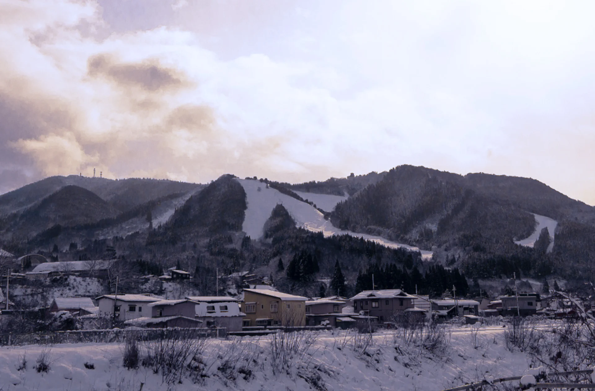 Mountains of Owani Onsen ski resort above the village