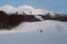 A couple skiers down the groomed run at Iwakisa Hyakuzawa