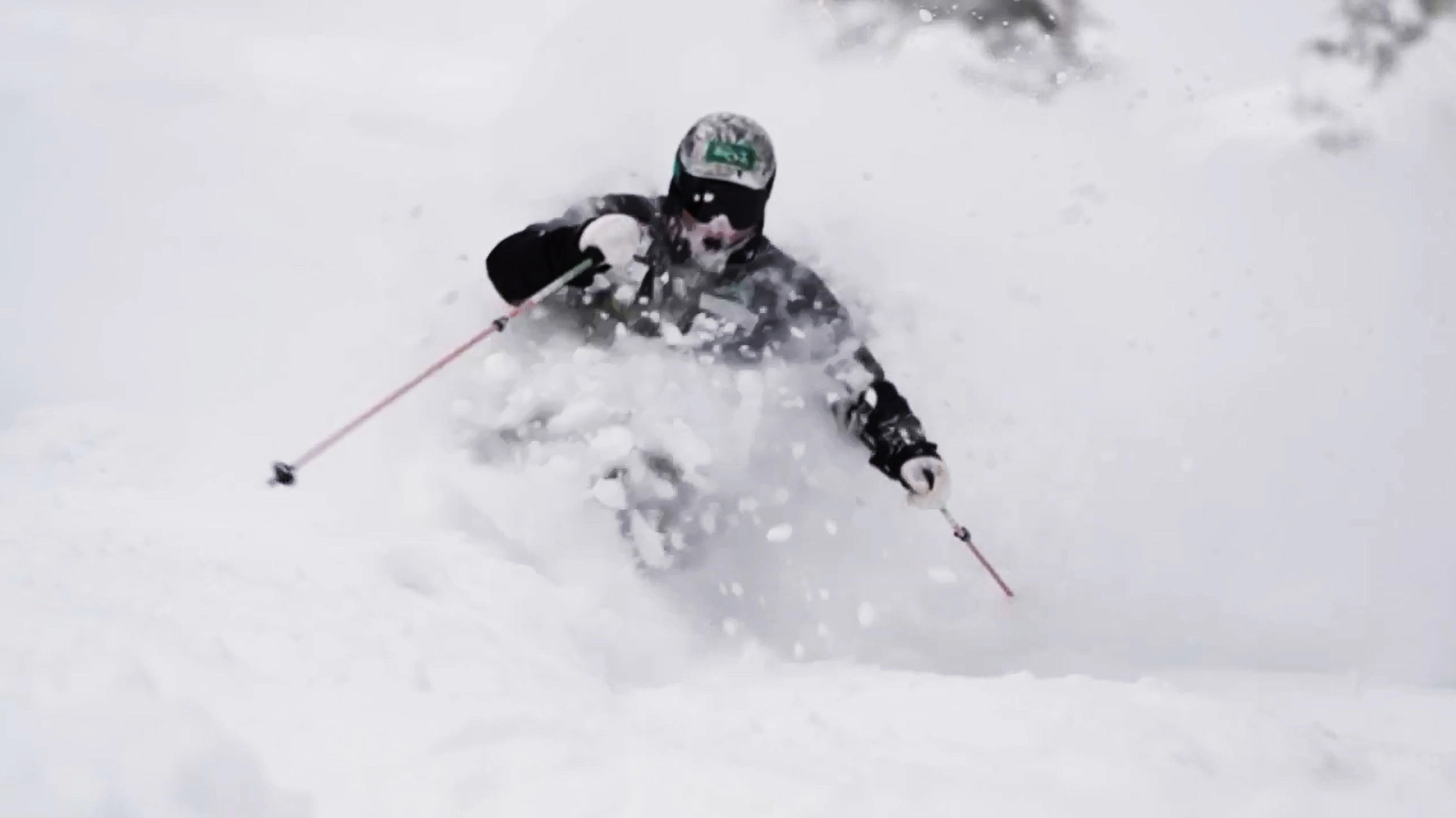 Skier hitting a nice patch of fresh japow at Okushiga Kogen