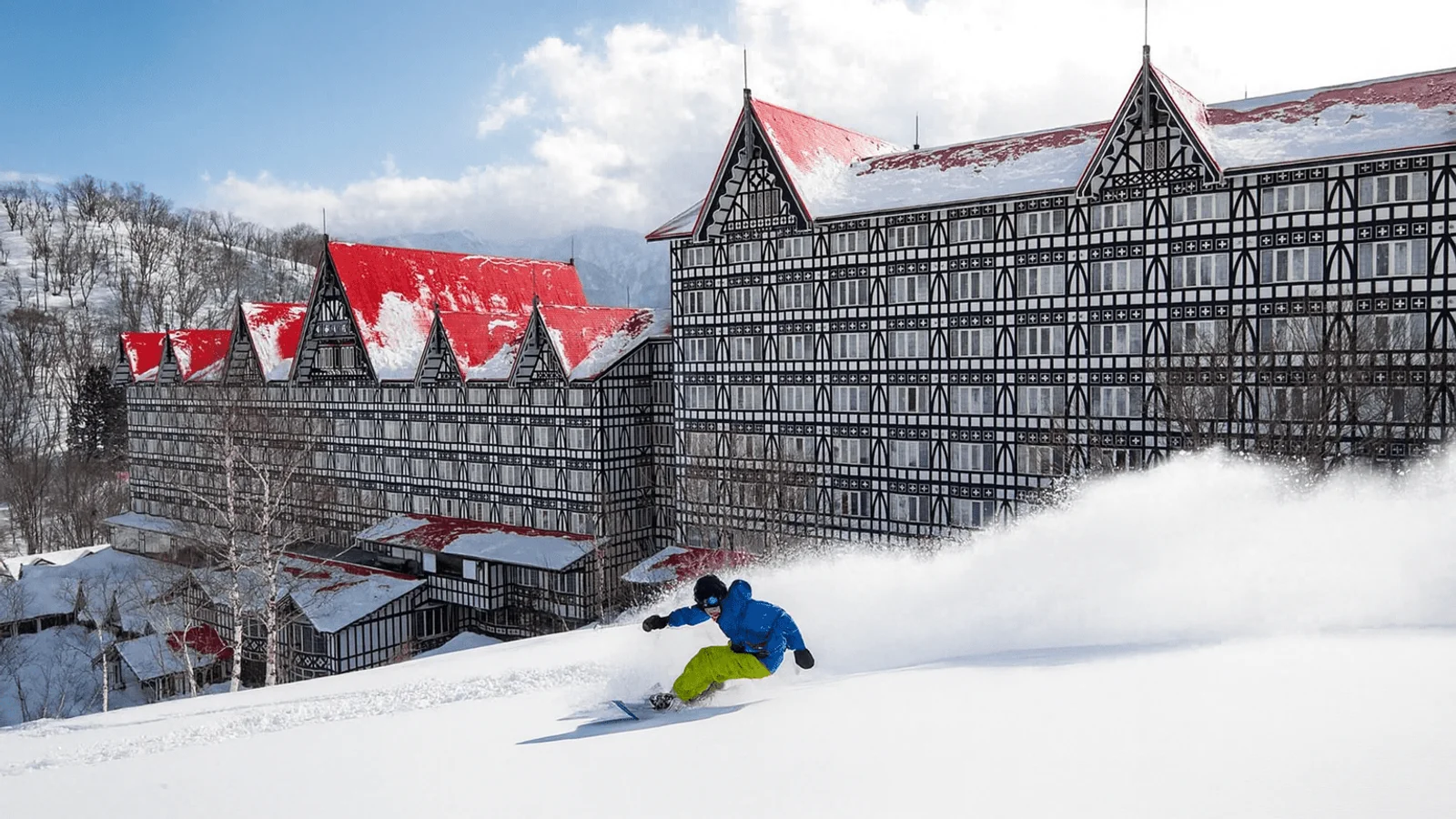 Skier nearby the Hotel Plaza Hotel at Cortina