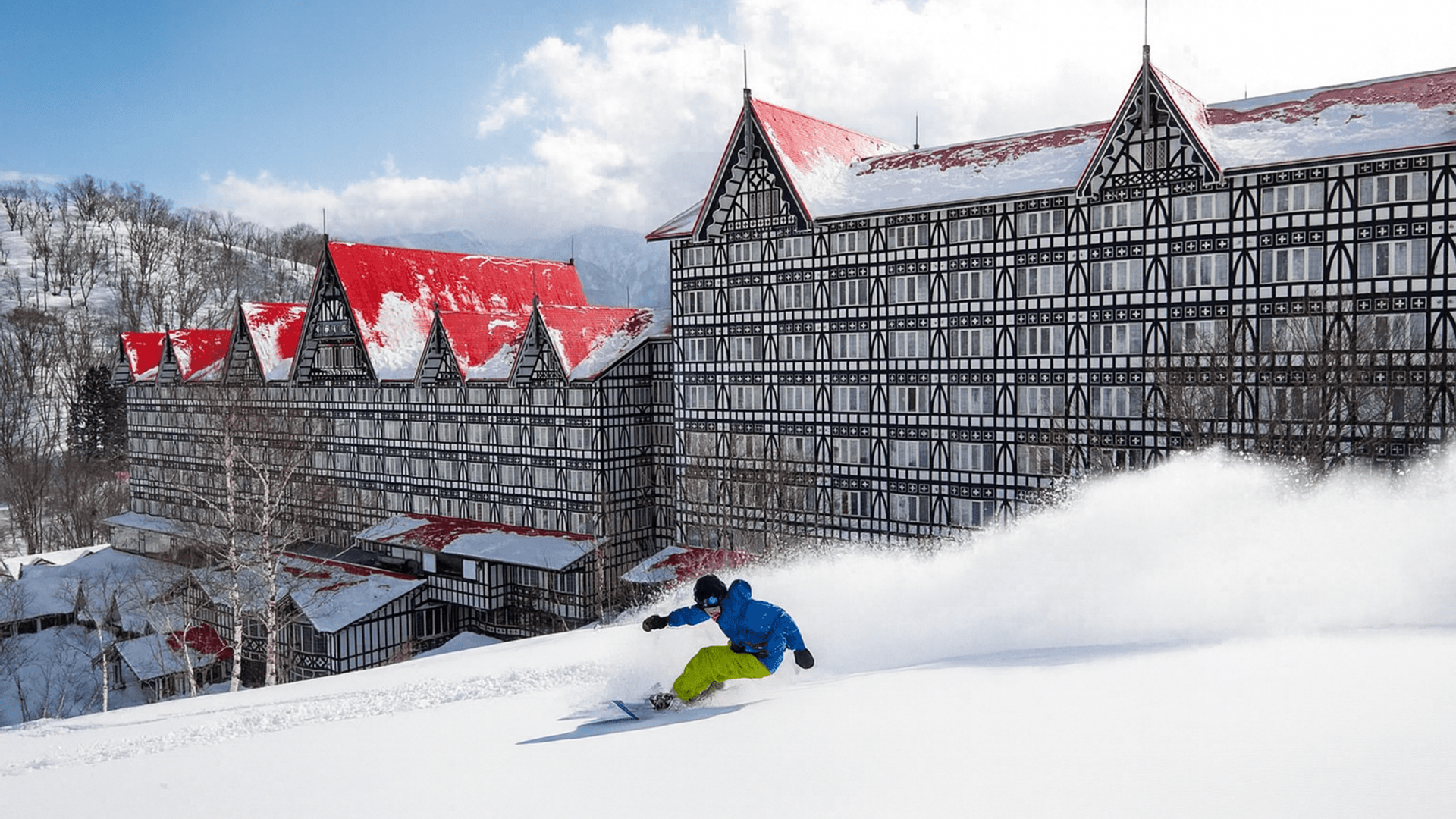 Skier nearby the Hotel Plaza Hotel at Cortina