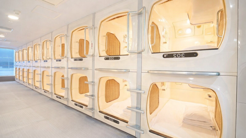 A row of capsules, in a Capsule Hotel in Japan