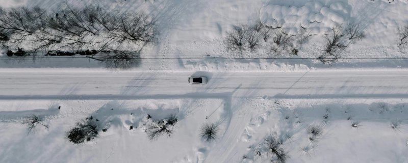 Top down view of a car driving in Hokkaido