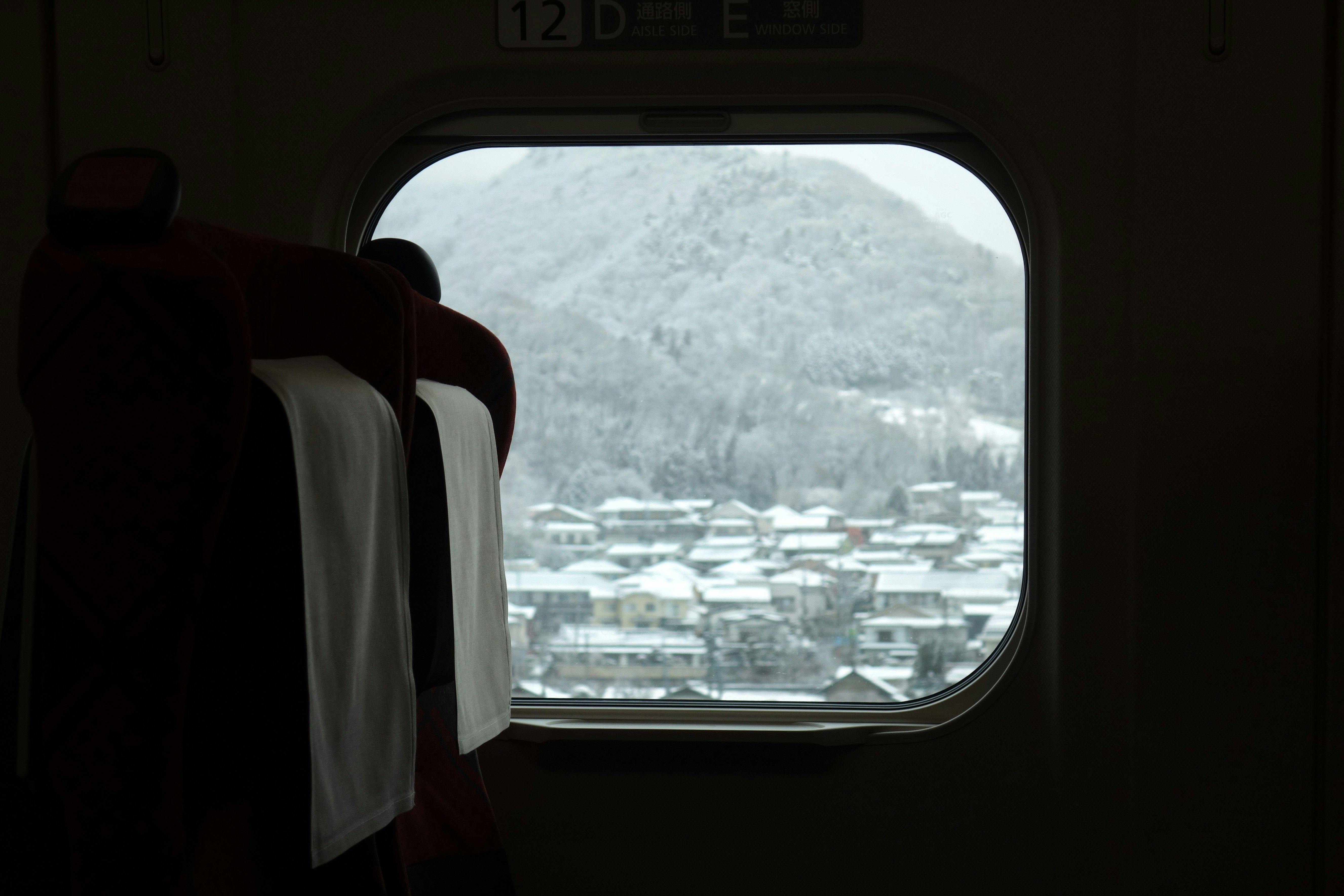 View out to the snow from a japanese airline