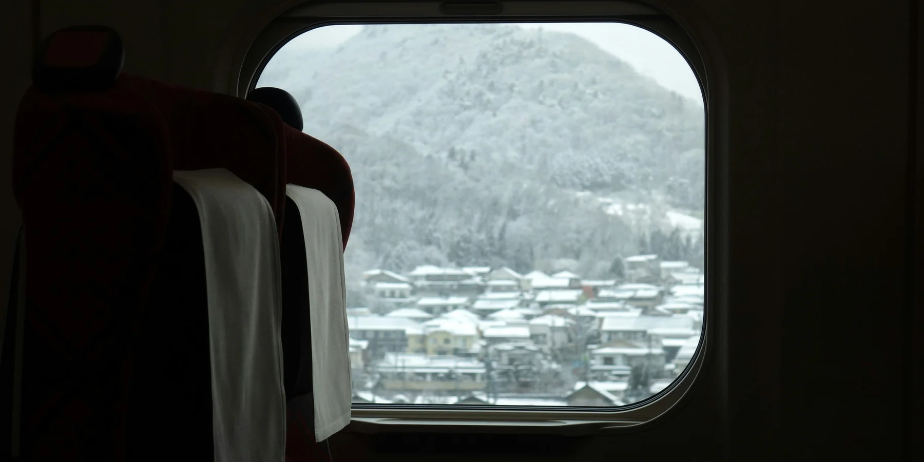 View out to the snow from a japanese airline