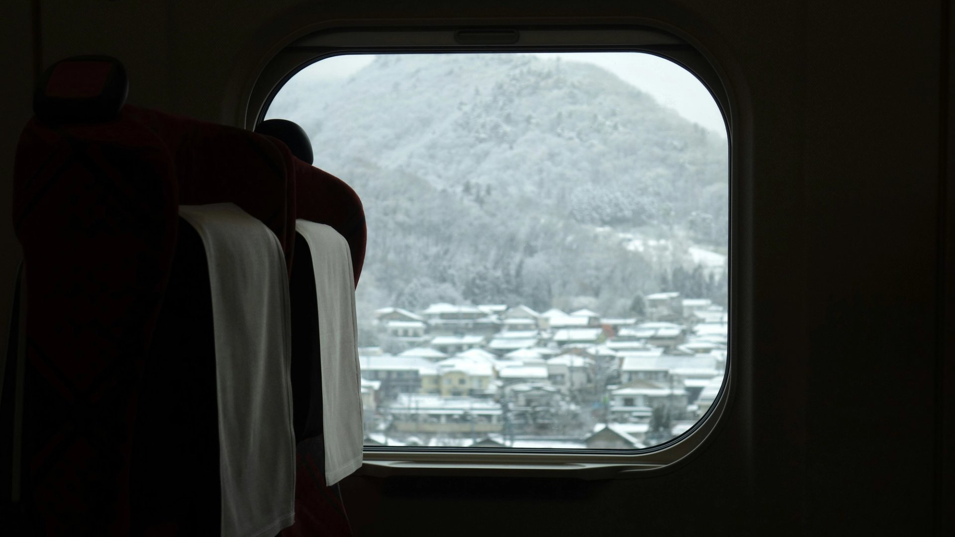 View out to the snow from a japanese airline