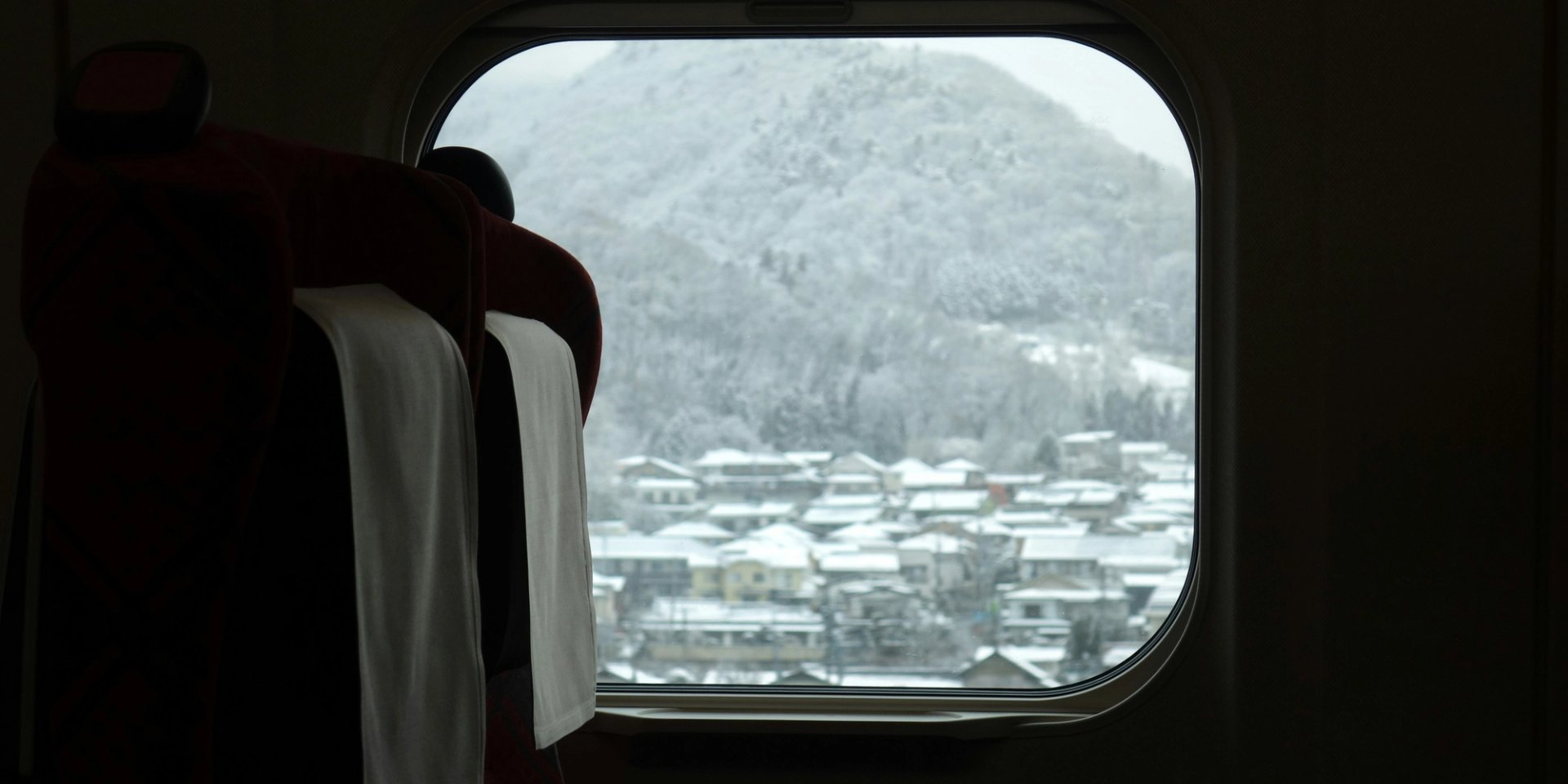 View out to the snow from a japanese airline