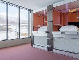 Capsule accommodation with storage for ski gear