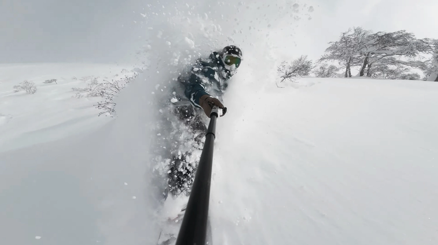 Snowboarder in Hanazono pow